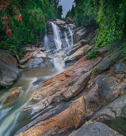 Beautiful Turga waterfall having full streams of water flowing downhill amongst stones , duriing monsoon due to rain at Ayodhya pahar (hill) - at Purulia, West Bengal, India.